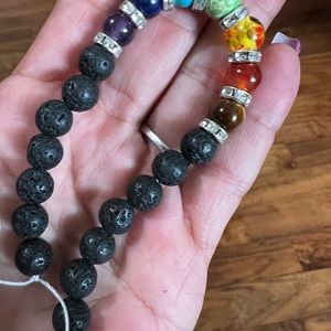Custom chakra bracelet with black lava beads